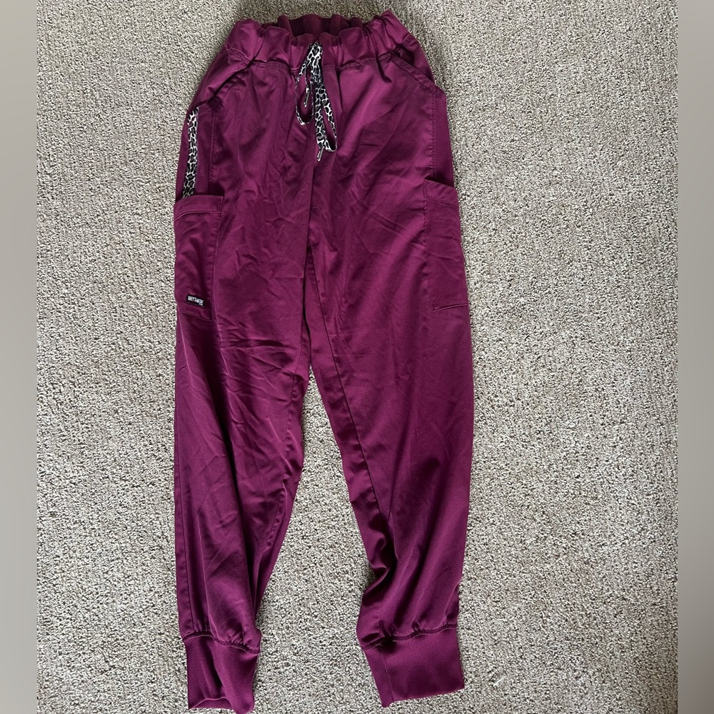 Cheetah print maroon jogger scrub pants